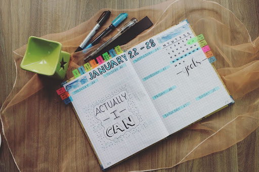 Diary with calenders and goals to manage multiple career schedule