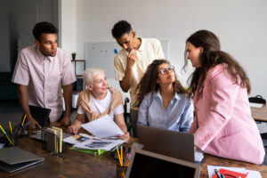 a-group-of-people-discussing-in-a-office-setting