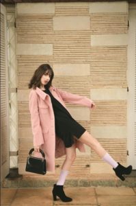 woman-wearing-pink-overcoat-and-black-inner-top