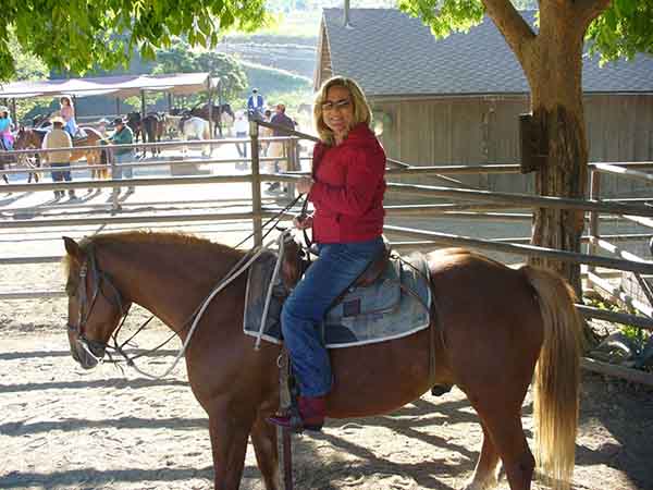 sherry-opacic-riding-a-horse