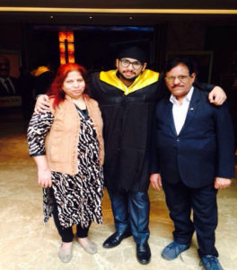 Palash Arneja in convocation ceremony with parents