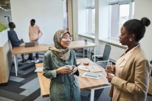 Women Holding Drinks while Having Conversationdiversity and inclusion