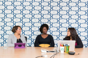 women-of-diverse-races-on-a-workspace