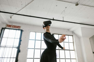 woman-dancing-while-wearing-virtual-reality-glasses