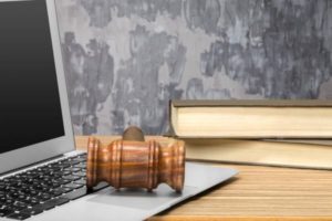 Laptop And Mallet On Table, tips for law graduates