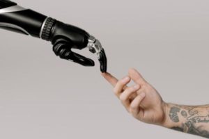 Bionic Hand and Human Hand Finger Pointing, tips for law graduates