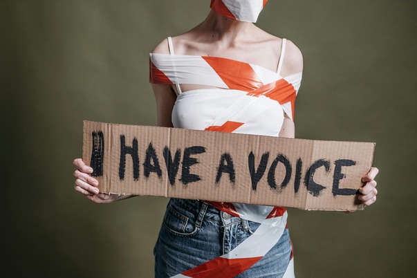 a-woman-holding-a-placard