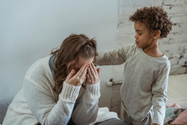 small-child-comforting-a-distressed-woman