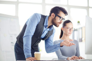 a-women-and-man-working-together-in-office