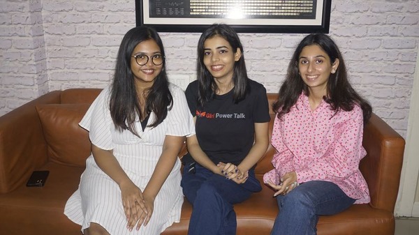 three-ladies-siting-on-a-couch