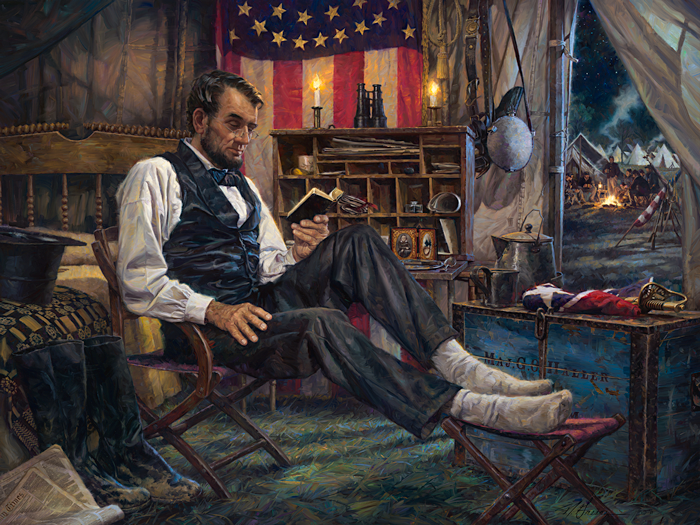 Abraham Lincoln sitting and reading 