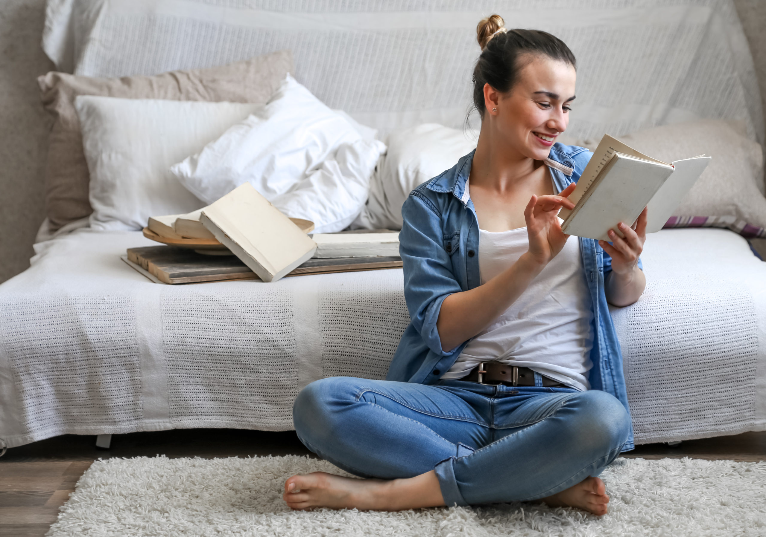 Image showing a person reading book on floor