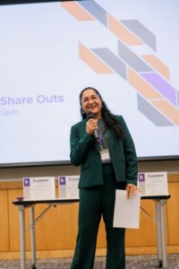 sparking-inspiration-on-stage-at-the-leadership-Triangle-Emerging-Leaders-Program