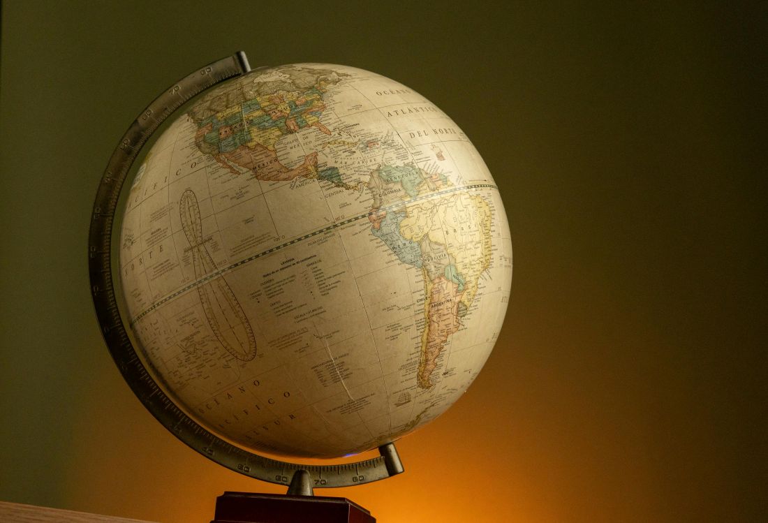 World globe on wooden stand