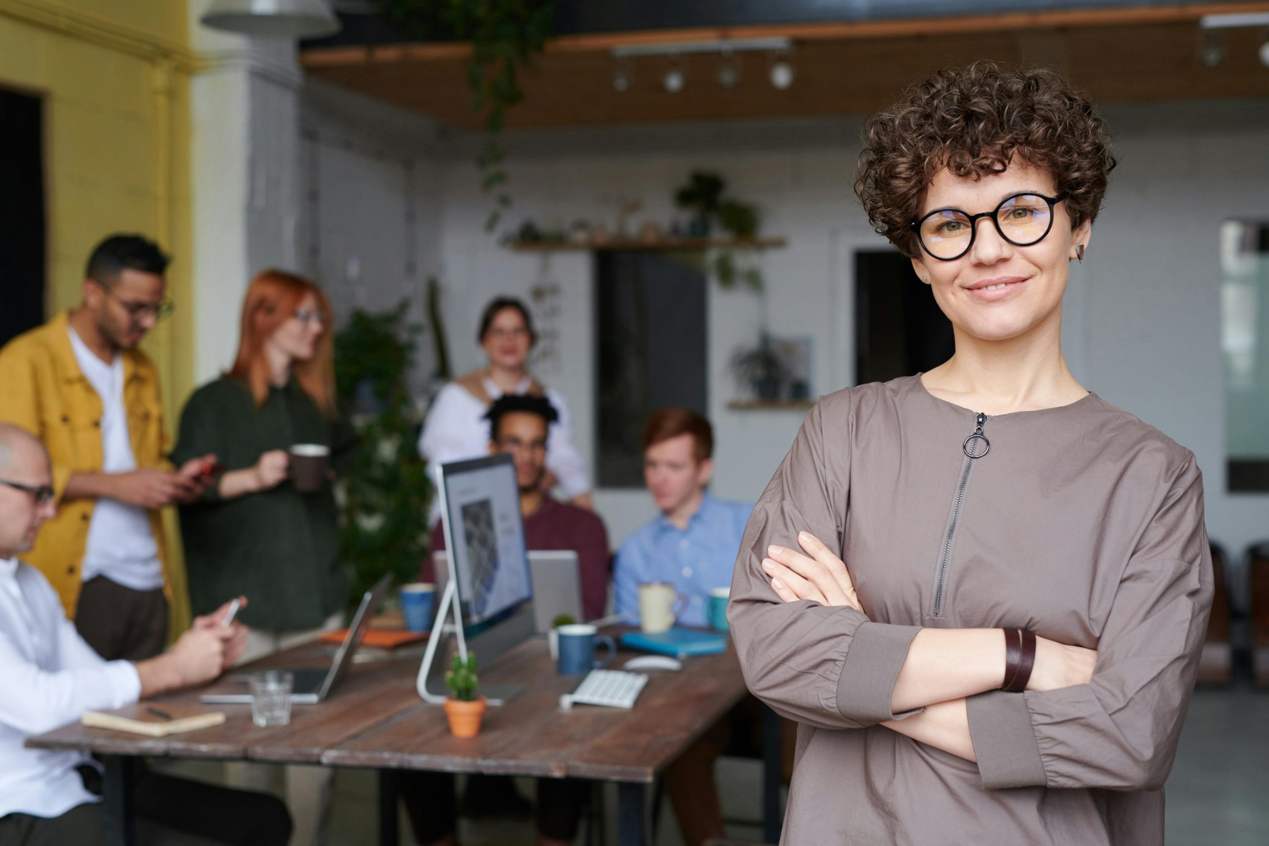 Photo of women wearing glasses in a corporate setup Photo-Of-Woman-Wearing-Eyeglasses