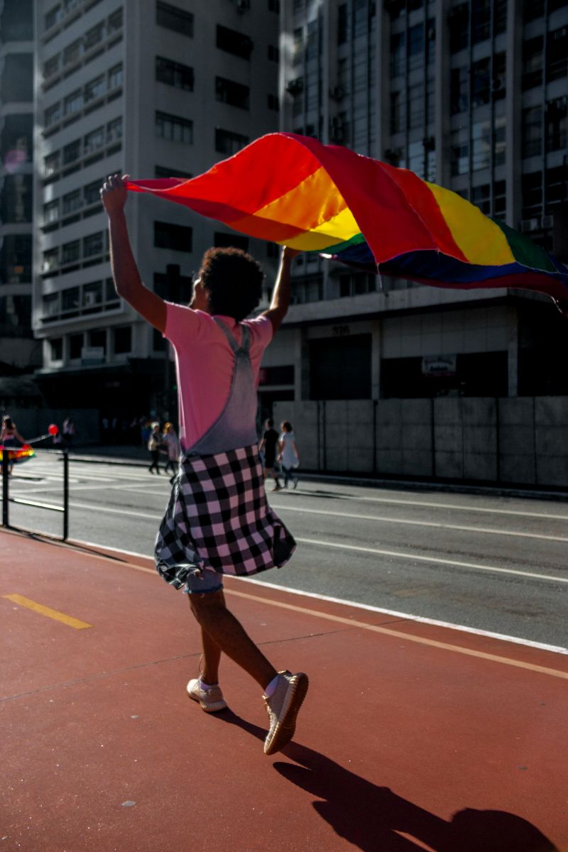 woman holding pride flag