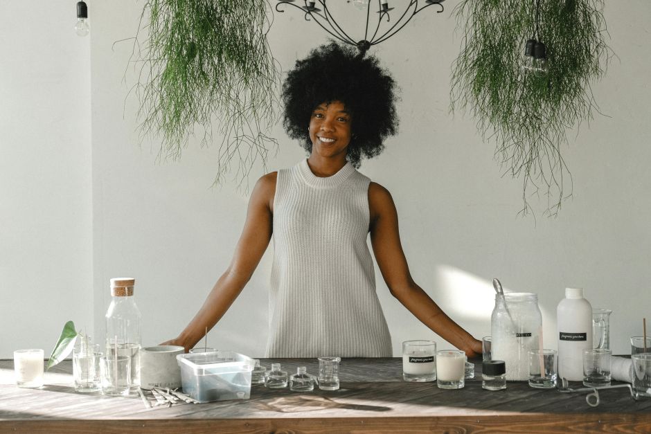 Woman-entrepreneur-standing-confidently-at-her-sustainable-workspace-symbolizing-conscious-capitalism-built-on-ethics-purpose-and-innovation.