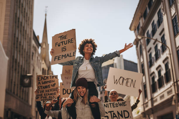 women-marching-together-for-equality-holding-signs-that-echo-the-fight-for-freedom-and-collective-voice.