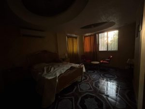 morning-light-streams-into-a-dark-room-softly-illuminating-the-space