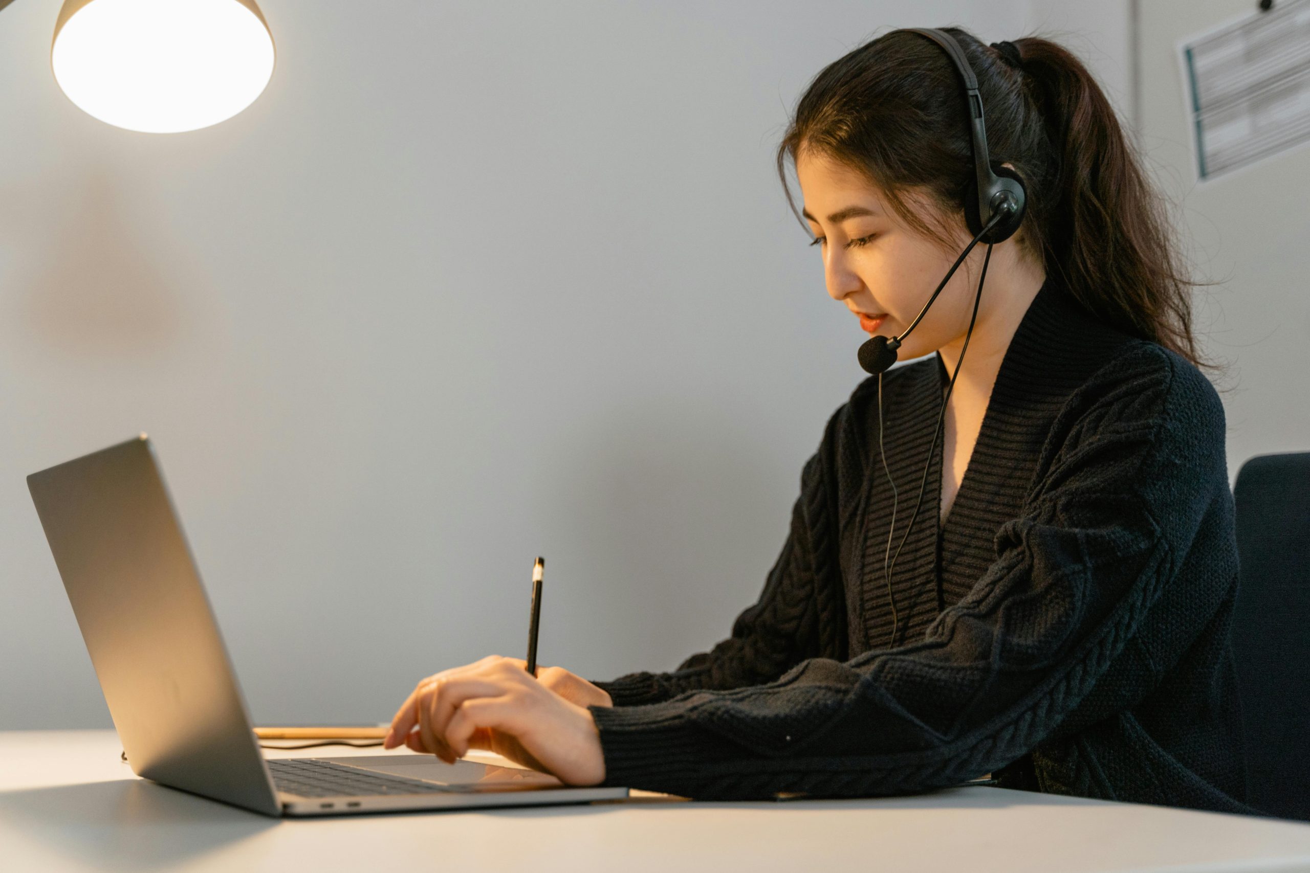 A Working Wearing Headphones while Working