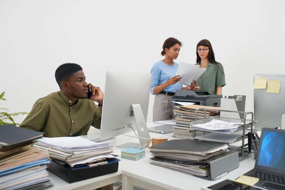 medium-shot-bored-people-working