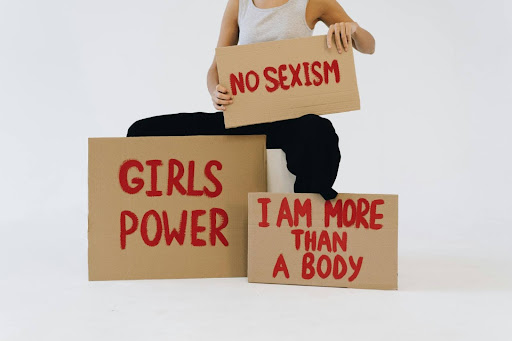 a-woman-showing-three-placards
