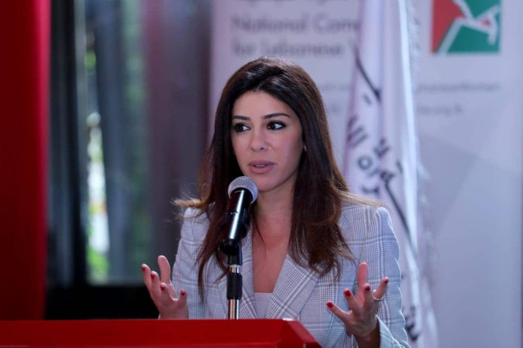 rhea-jabbour-speaking-in-front-of-a-mic