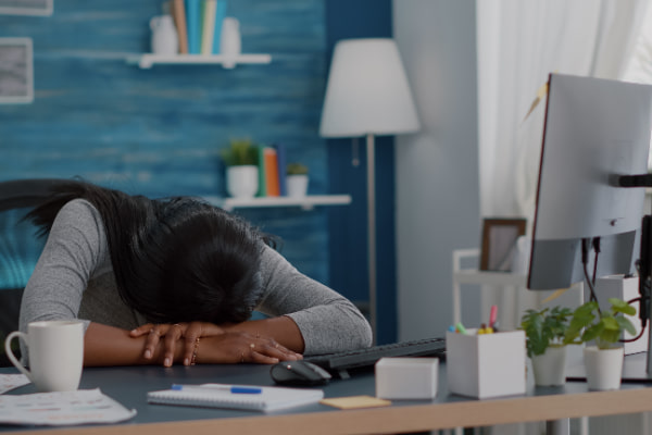 disappointed-workaholic-student-sleeeping-desk-table-living-room-after-working-remote-from-home-job-project-deadline