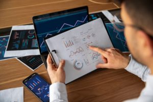 office worker analyzing outsourcing budget