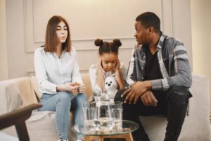 young-girl-traumatized-by-being-mediator-between-parents