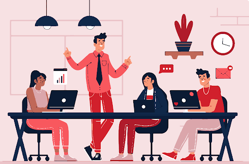 An illustration in shades of pink and red, showing an office team meeting. Four people are gathered around a long desk. 